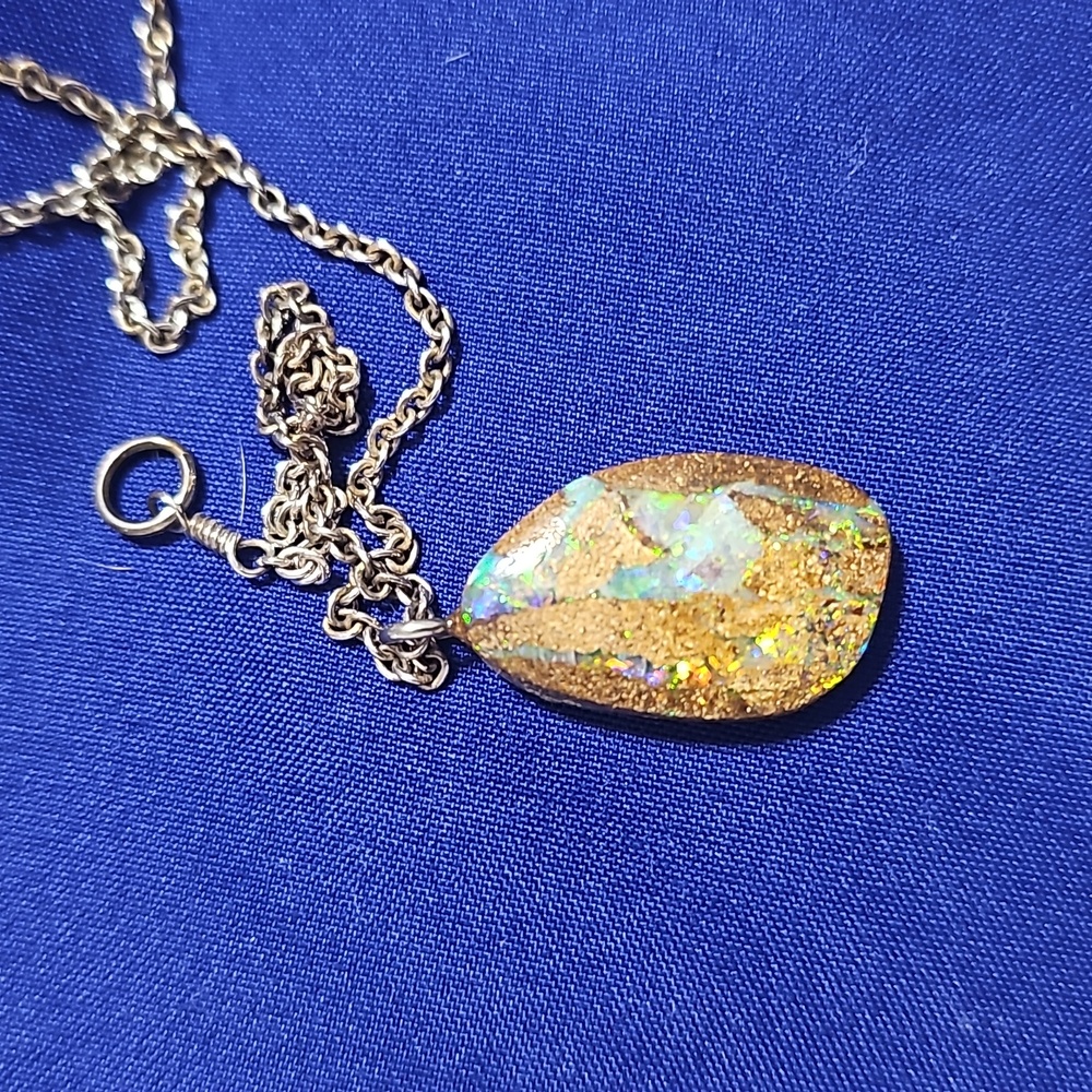 Australian boulder opal pendant with silver 18" chain.